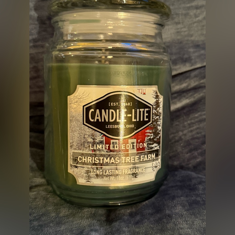 Candle-lite 18 oz. candle “Christmas Tree Farm” NEW/UNUSED Burn time 70-110 hrs